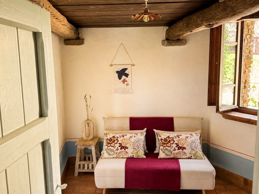 Stanza nel soppalco con divano letto nell'appartamento Il belvedere, Borgo Braila, Umbria